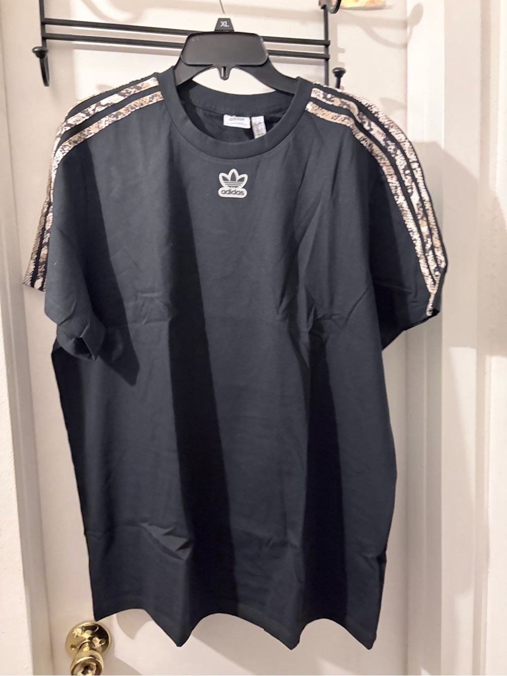 Adidas- size XL- black short sleeve tee with snakeskin trim. New from bag.